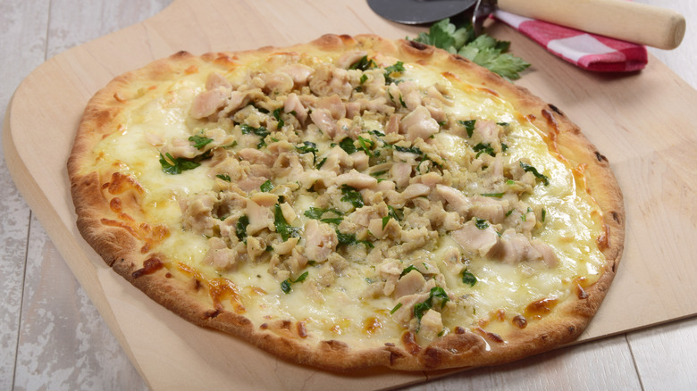 White pizza with clams and fresh parsley 