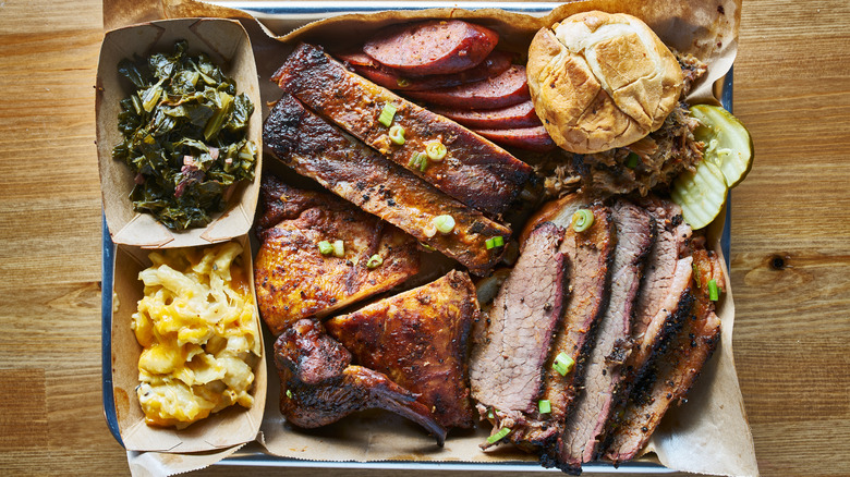 platter of smoked meats and sides