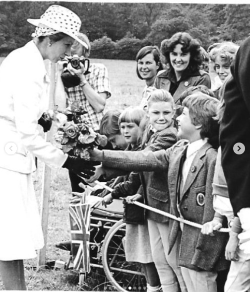 A photo of Princess Anne engaging with children dated November 2021 | Source: Instagram/theroyalfamily/