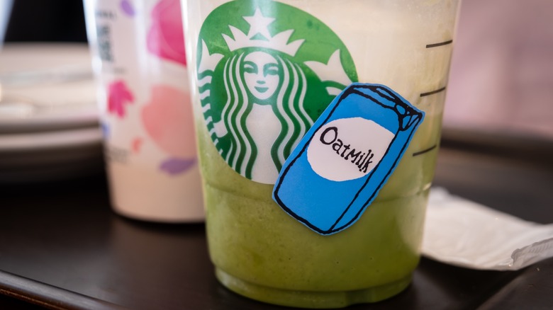 Oat milk sticker on Starbucks cup